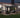 REAL Tempered Glass Sunroom With Bi-Fold Doors Greenhouse Patio Home Addition - Black (12' Wide)