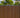 Weathered Teak with black gap wood composite fence kit with horizontal slats